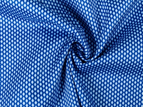 Синяя ткань с геометрическим принтом хлопок