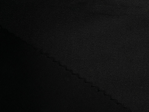 Однотонная ткань глубокого чёрного цвета из хлопка и лайкры