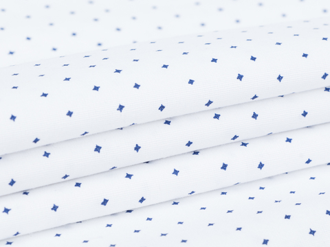 Белая ткань с синими звездами хлопок с полиэстером