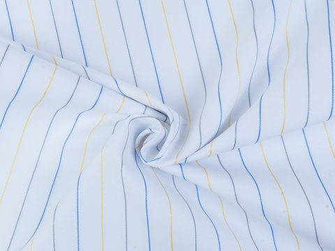 Голубая ткань в серо-сине-жёлтую тонкую полоску из полиэстера и хлопка