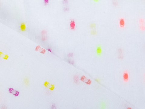 Ткань белого цвета в мелкий разноцветный горох из хлопка